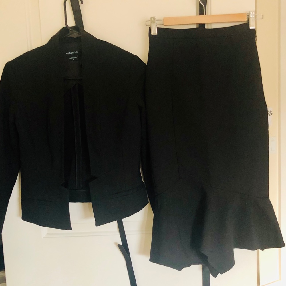 Women’s designer 2 piece suit by Marciano’s